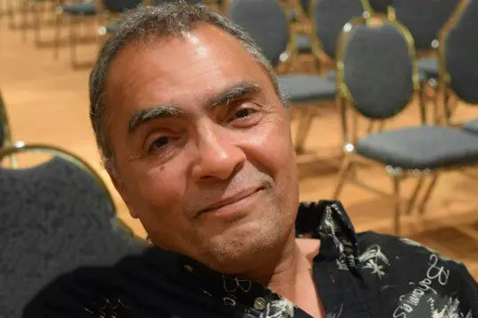 Man smiling casually