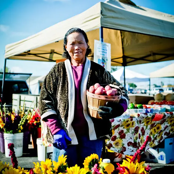 Woman standing at farmer's market