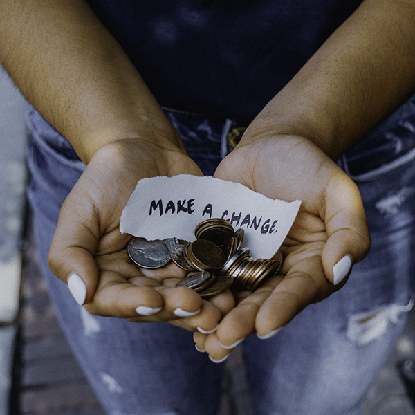 Hands holding change
