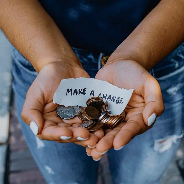 Hands holding change