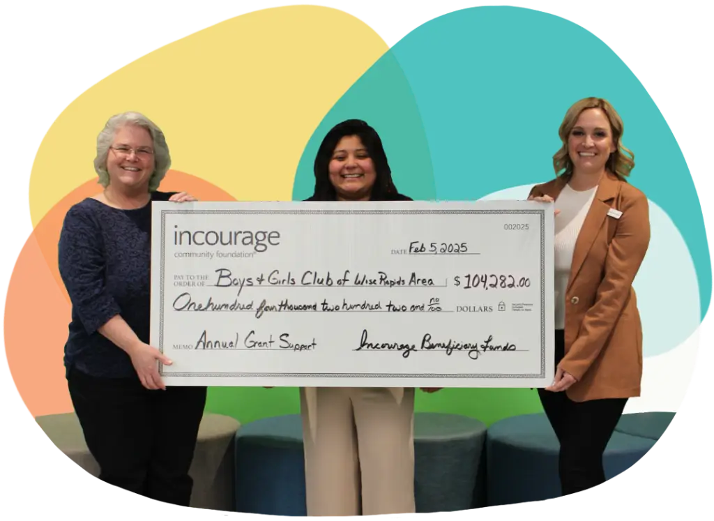 Photo of large check being presented